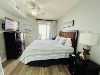 Master king bedroom with gulf view opens to balcony and has smart tv