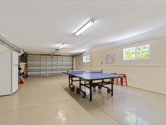 Garage with second fridge, ping pong table, games