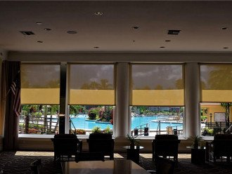 inside of a large Community Center with pool view