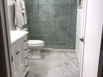 Spacious master bathroom with adjoining walk-in closet