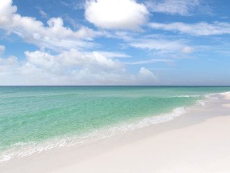 Enjoy the white sandy beaches of Miramar just a short walk away from Vitamin Sea!
