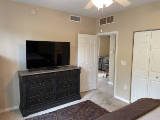 Master bedroom with large screen, smart TV… Walk in closet