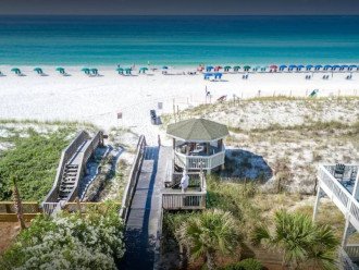 Steps to Private beach access- you will fall in love with the white sand and the emerald green waters!