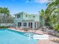 Steps away from the beach. Classic coastal Florida residence with a heated pool.
