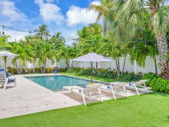 The tropical garden features many lounge areas and a heated pool.