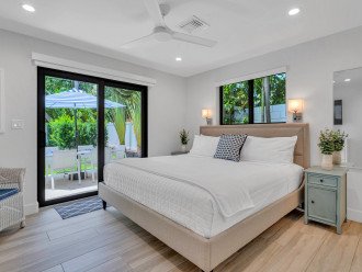 The second bedroom features a King bed, En-suite Bath, Smart TV, and pool access