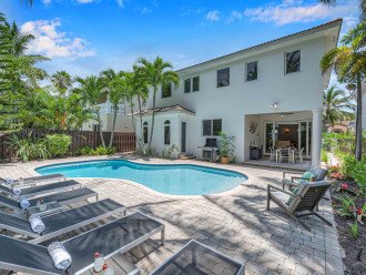This 4-bedroom, 4 full bath travelers paradise is the ideal place to relax, have fun, and enjoy the very short walk to the famous Fort Lauderdale Beach