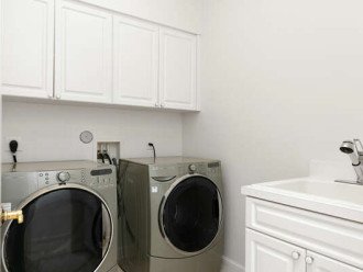 You will also find the laundry room downstairs, with both a washer and dryer.