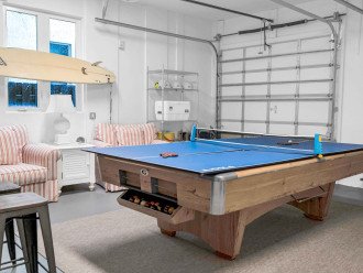 There is a large game room inside the garage, too!