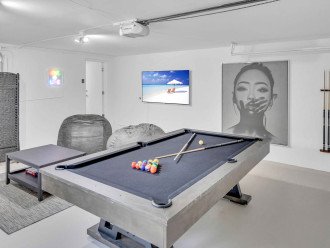 The game room features a pool table, board games and bean bag chairs!