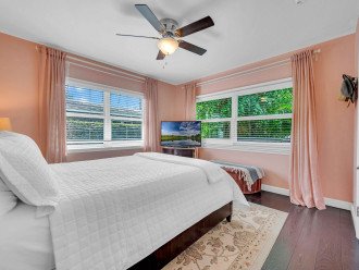 The third bedroom features a queen-sized bed and a Smart TV. It also has plenty of windows, just in case you want some extra sun!