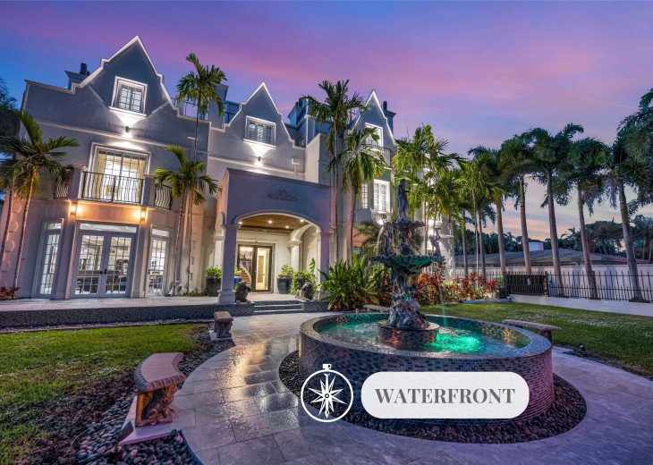 The Modern Castle - Florida's most exclusive vacation home and event venue. Three stories waterfront villa with elevator access, a roof top, idea for family gatherings of event for up to 190 guests.