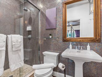 Bedroom's Three en suite bathroom features a walk-in shower