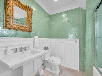 Bedroom's Six en suite bathroom features a tub/shower combo.