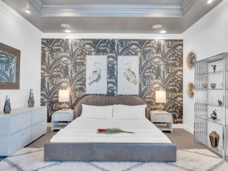 The "master" bedroom, aka the Silver Room. This room features a king-sized bed and a wall-mounted Smart TV