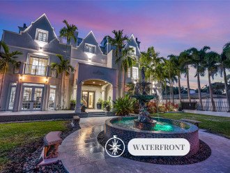 The Modern Castle - Florida's most exclusive vacation home and event venue. Three stories waterfront villa with elevator access, a roof top, idea for family gatherings of event for up to 190 guests.