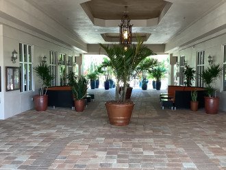Breezeway to the pool, exercise room, and covered seating area, amenity center.