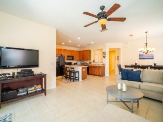 Family living area equipped with a fan and TV
