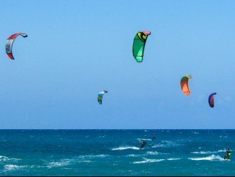 Some days it's windy and you can watch kite-surfers jump 20 feet in the air