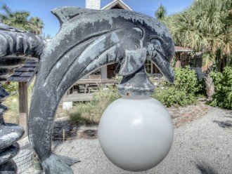 Dolphin street lamp in front yard