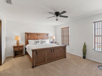 Master Suite has a Task Table, Large Dresser with Large Smart TV & Cable Box.