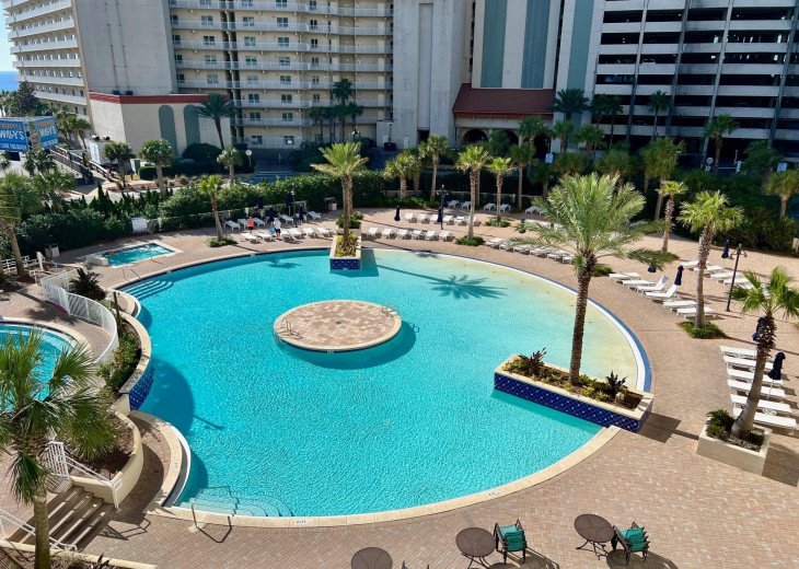 Ground floor pool, hot tub, tiki bar and grill. We have heated pool for winter
