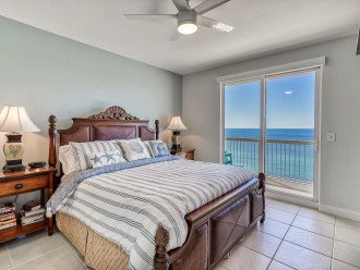 Master bedroom with king size bed, private balcony access & beautiful views