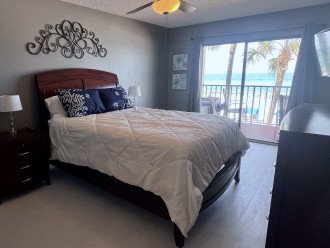 Primary bedroom w/Gulf front balcony, attached full bathroom & huge closet!