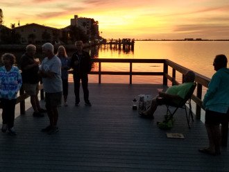 Common dock for social gatherings at sunset