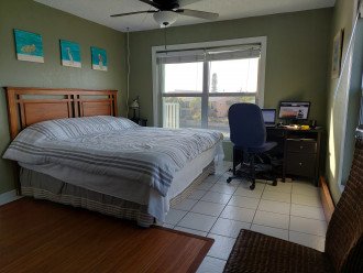 Master beroom with king bed and desk