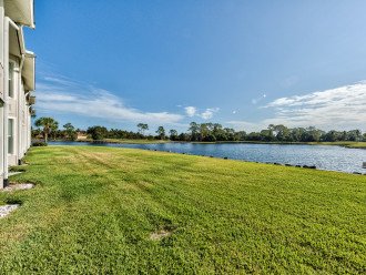 View from Private Screened in Lanai with Dining and Seating; Lake and Golf Views! 2 Championship Golf Course in the Back Yard!