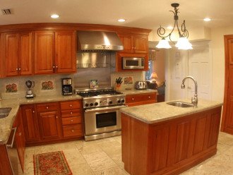 Our kitchen equipped with granite counter tops and Thermidore dual fuel range.
