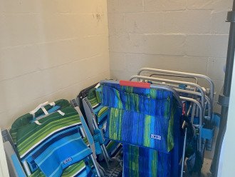 Storage closet with beach buggy and chairs