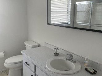 Second clean full bathroom with a shower and bathtub.