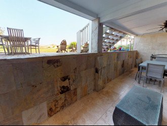 1st Floor Covered Patio - All Stone Walls and Floors
