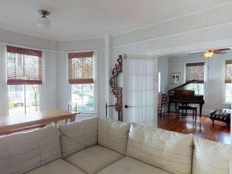 French Doors lead to separate Living Room with Grand Piano