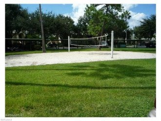 the sand volleyball court is just a short walk down the street