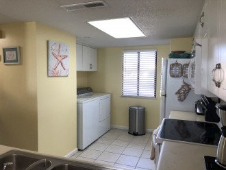 Full size washer and dryer in unit.