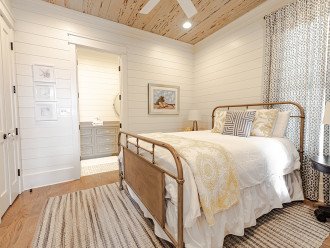 Bedroom 3 features a queen bed.