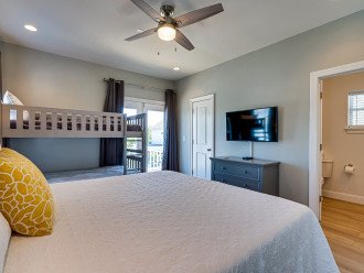 Bedroom 3 features a king bed & bunk bed with ensuite.