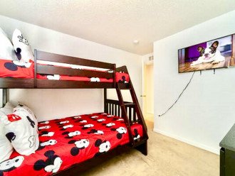 Bedroom with bunkbeds and TV
