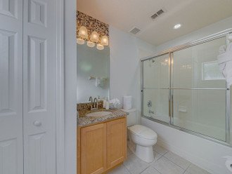 Bathroom with shower over bath