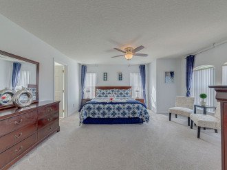 Additional view of the master bedroom, highlighting a bright spacious room