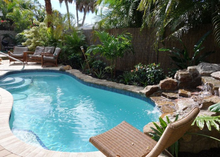 Our lush palm tree lined pool is completely private and heated to 88F