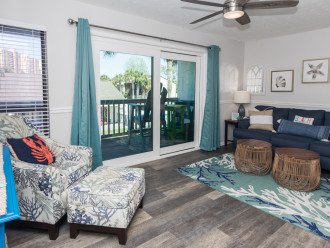Balcony overlooking 2 pools and hot tub! Steps to BEACH!!