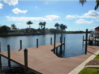 Large Boat dock on wide intersection direct gulf access water ways