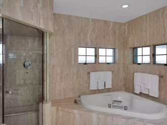 Master walk in shower and Jetted tub with ocean views