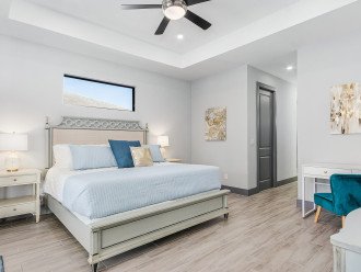 The luxury en suite includes a king size bed, 60 inch Roku TV, work station, two walk-in closets, walk-in shower complete with three shower heads, and soaker tub. Enjoy the anti-fog and lighted mirrors above each vanity as well.