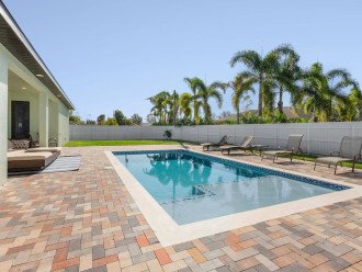 The south facing saltwater pool provides all day sun exposure. Enjoy the heated saltwater pool in this private and peaceful backyard. Pool also has a splash pad deck for lounging or children to enjoy.