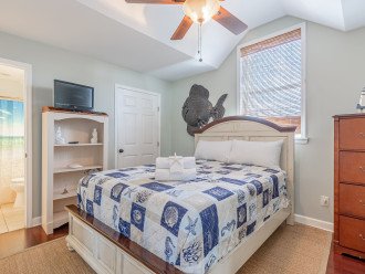 Bedroom 3 offers a Queen Bed, tv, Private Bath & ceiling fan.